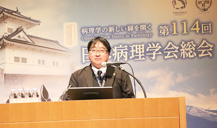講演する佐々木氏