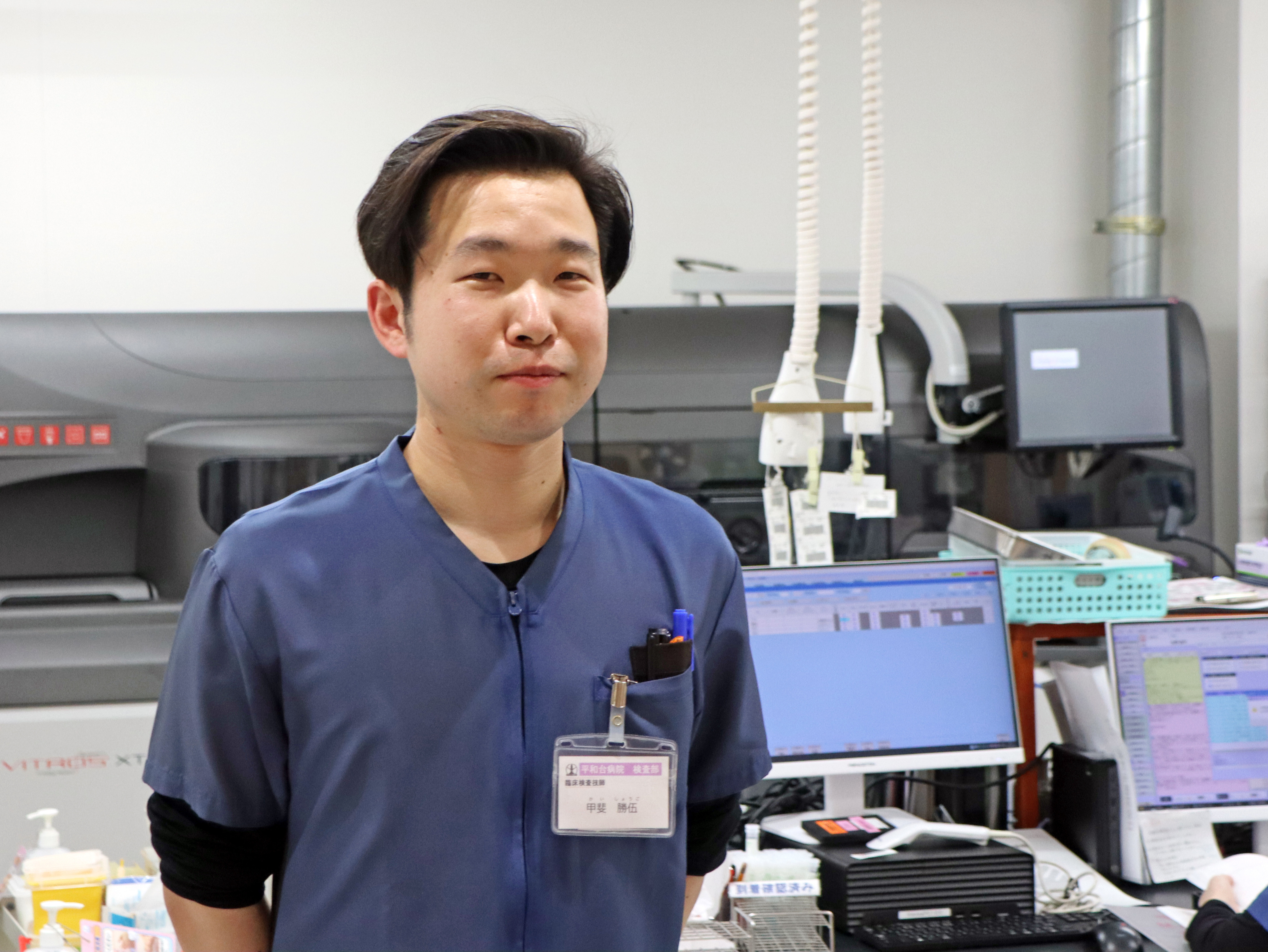 検討の中心になった 検査技師5年目の甲斐勝伍氏
